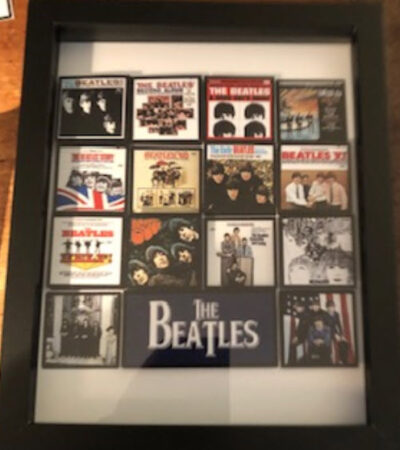 3-D, 8 x 10 featuring Beatles albums, $25